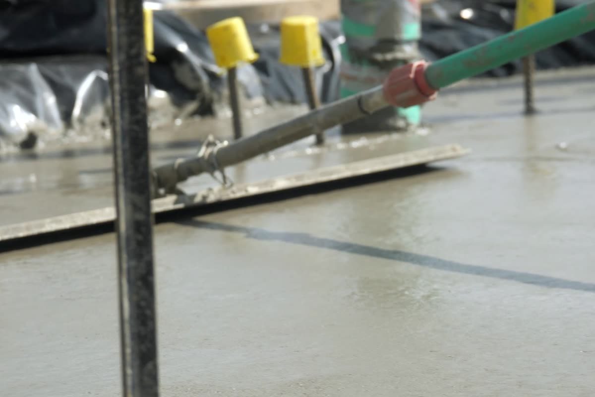 Screeding a freshly poured concrete path